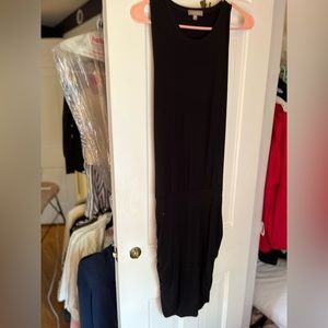 Really cute summer dress  gathered at the waist which makes it a short skirt